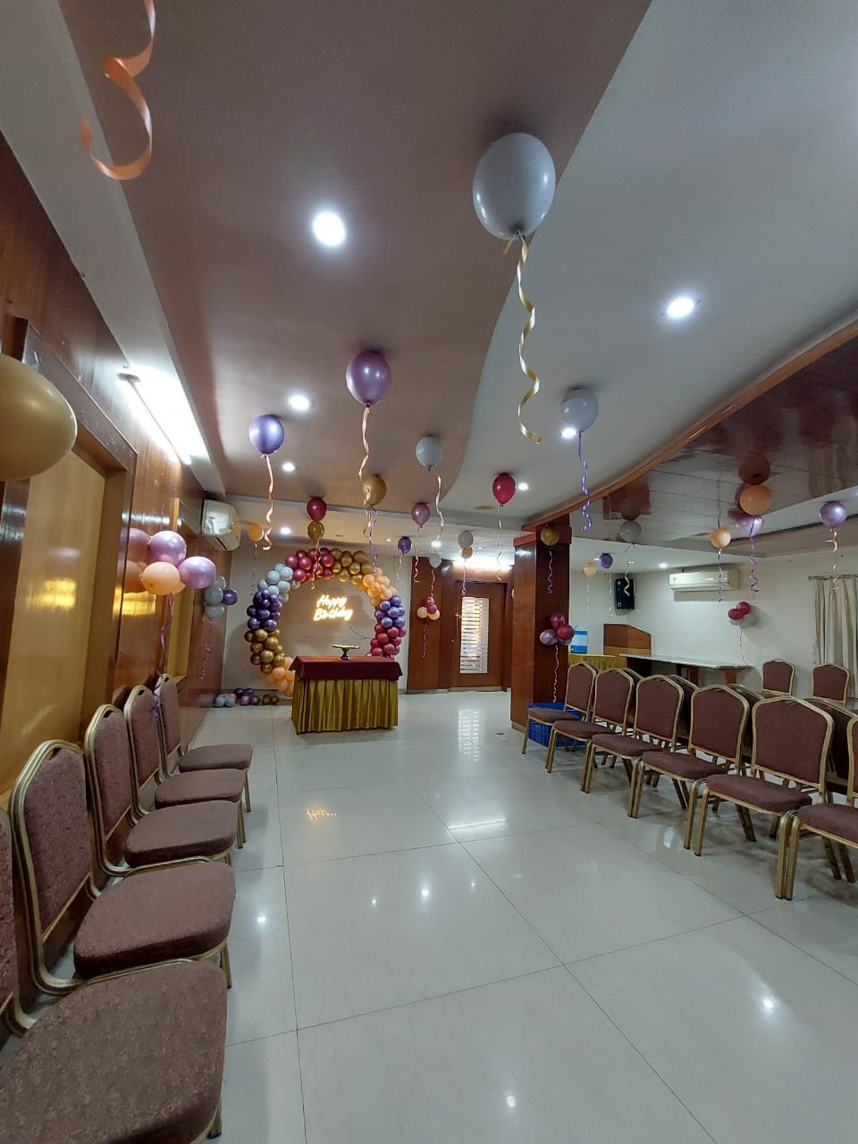 Opulent Luxury Suite with living area, marble floors and panoramic city views at Landmark Hotel